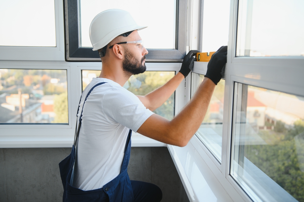 Man doing repairs windows